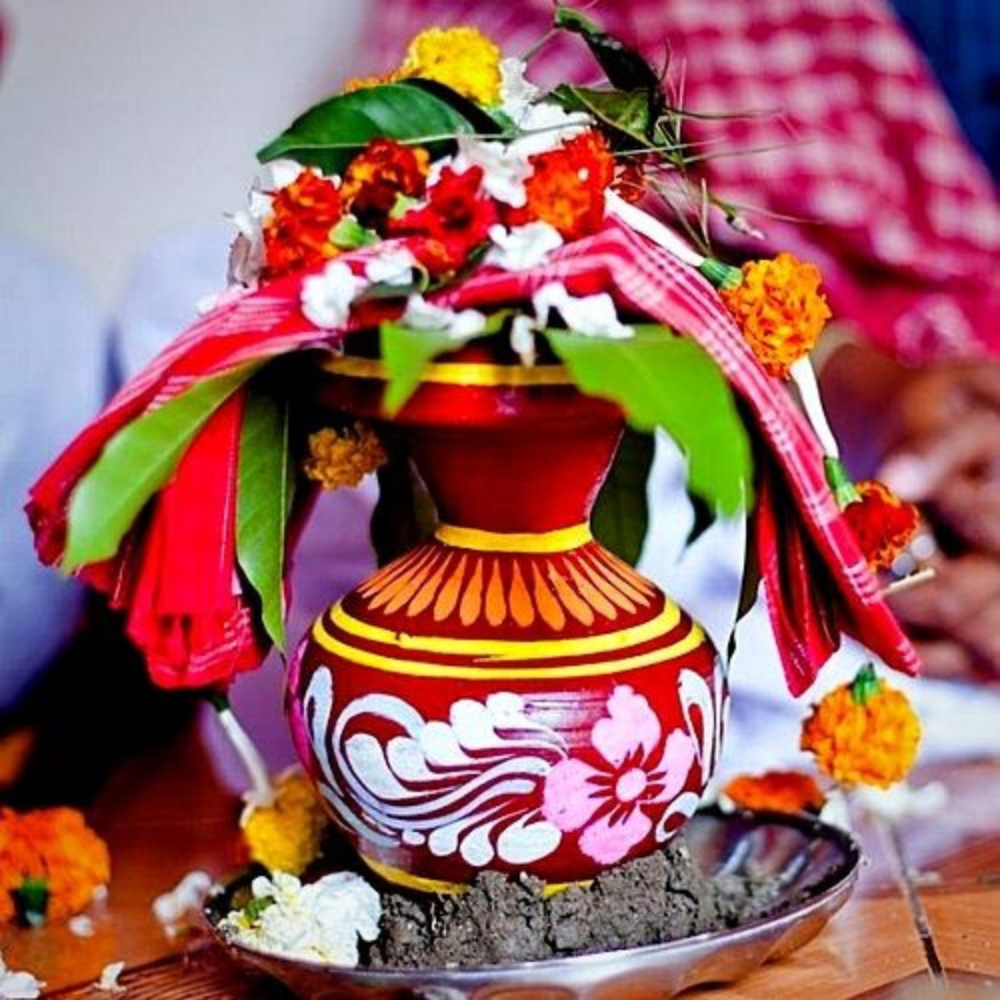"Traditional Bengali Wedding Puja Items: A collection of decorative items including sacred utensils, flowers, incense sticks, sacred thread, turmeric, betel leaves, and other ceremonial objects used in Bengali wedding rituals."