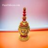 "Traditional wooden sindoor box used in a Bihari wedding ceremony, a small red vermilion container symbolizing marital sanctity and commitment, placed on a decorated tray with intricate designs and cultural significance."