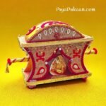 "Tatta Suchi Patra - Ornately arranged betel leaves, betel nuts, turmeric, and sweets on a decorative tray, symbolizing unity and familial bond in Bengali wedding rituals."